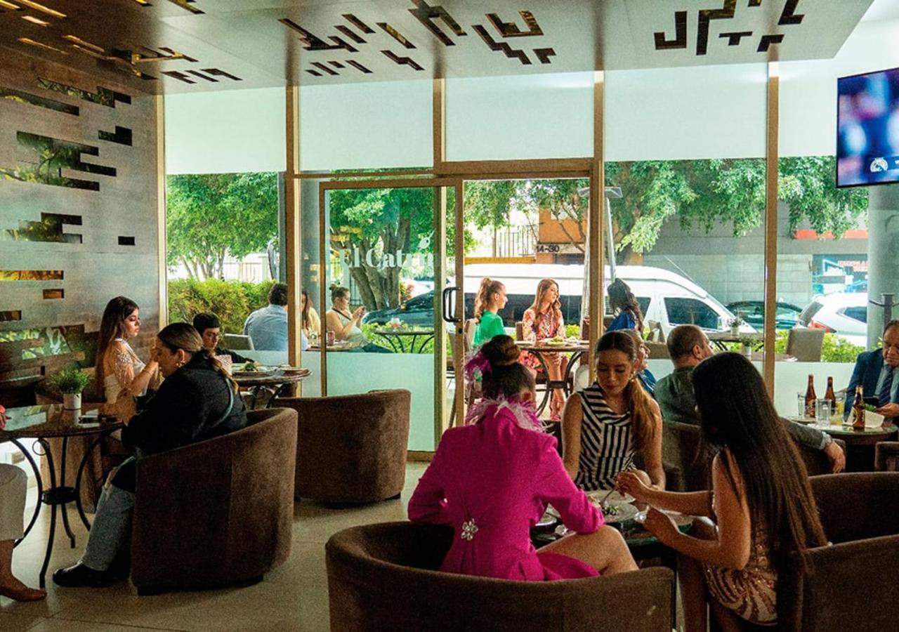 Clarion Suites Guatemala City Exterior foto Interior of a café in Yerevan